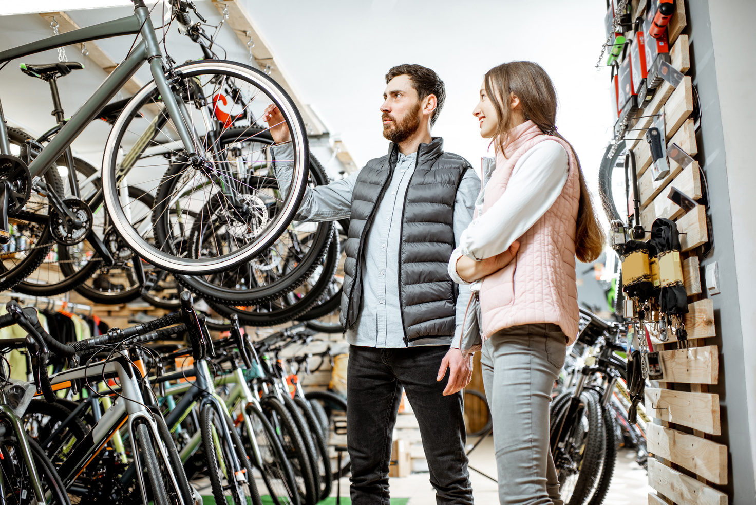 Woman with Salesman in the Bicycle Store